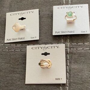 Silver and Green Rings